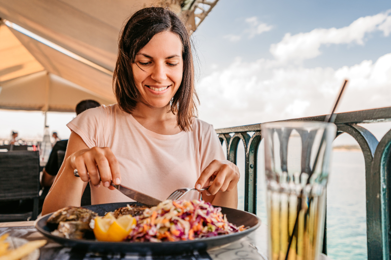 woman eating on cruise ship